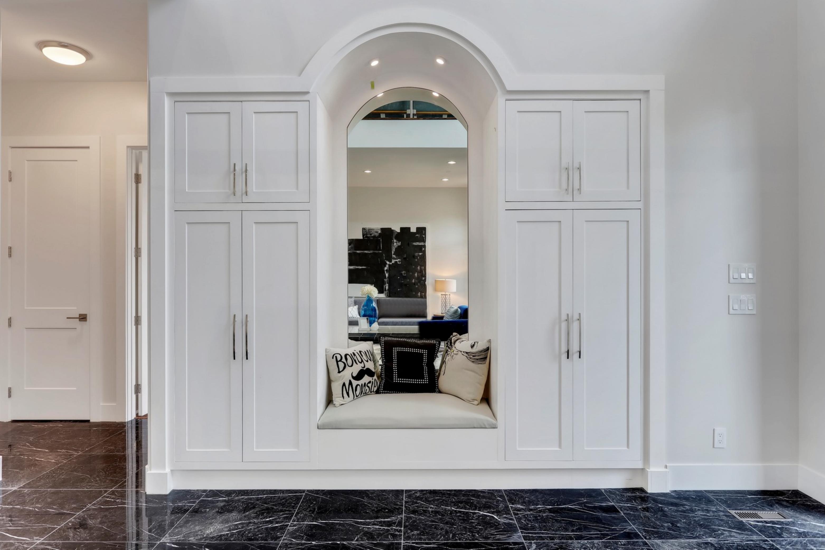 Killarney Custom Residence arched built-in reading nook with mirror and bench seat