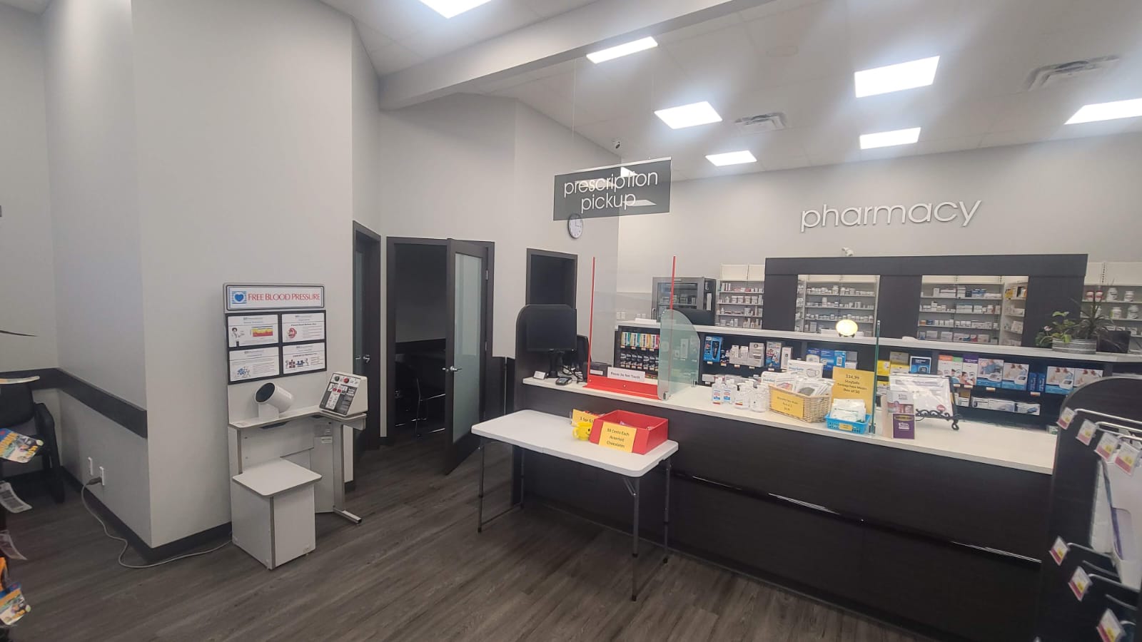 Pharmasave Sylvan Lake counter area with consultation room doors